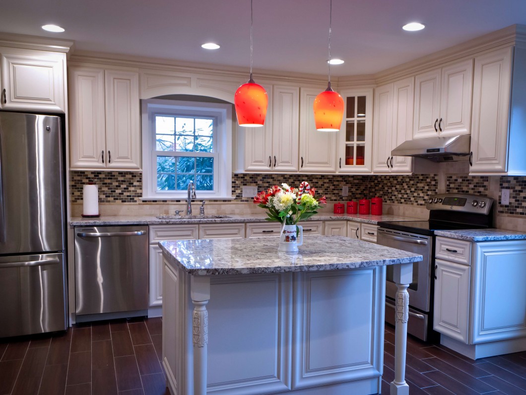 home kitchen with stainless steel appliances and island