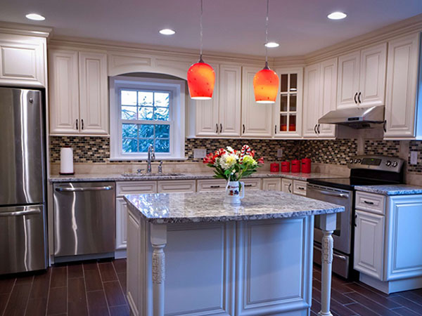 home kitchen with stainless steel appliances and island